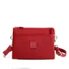 Bolsa de Ombro Personalizada Bolsa Feminina Casual Cor Sólida Bolsa Transversal Casual Bolsa de Nylon Casual Mão Nova Bolsa de Máquina Transfronteiriça