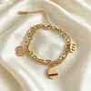 Pulsera de doble cadena de acero de titanio de moda transfronteriza europea y americana para mujer, simple y versátil, estilo ins, a la moda, lujo ligero, pulsera personalizada