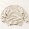 Ropa de punto para niños de comercio exterior de otoño e invierno, suéter de cuello redondo, color liso, estilo básico, unisex, para bebé, capa interior de otoño e invierno, capa base, top versátil