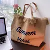 Bolso de Lona Tejida con Borlas Bordado con Letras Gran Capacidad Tote Bolso de Hombro Bolso de Mujer 2026 Nuevo Estilo Casual Viaje