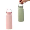 Nueva Botella de Agua Deportiva 316 Proceso de Pintura de Goma Acero Inoxidable Botella Espacial Asa Deportiva al Aire Libre Taza Térmica