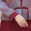 Nuevo vestido estilo chino para madres, corte holgado, longitud media, adecuado para primavera y otoño, diseño nuevo, de manga larga y con un aspecto en capas, diseñado para mujeres de mediana edad y mayores
