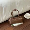 Bolso cruzado de diseño nicho simple para uso diario, de un solo hombro, para llevar debajo del brazo para mujer, nuevo modelo principios de otoño 2026, bolsa tipo almohada de gran capacidad
