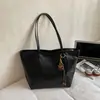 Bolso tote de gran capacidad de cuero encerado para otoño e invierno, estilo de alta gama para otoño 2026 para el trabajo y los desplazamientos, bolso de hombro único para mujer