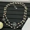 2025 Nuevo Modelo Réplica Chanel Disparo Real Corazón Tachonado con Diamantes Cadena de Suéter Doble C de Perlas Collar Largo de Gama Alta para Mujer