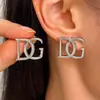 Brincos de Moda Transfronteiriços Europeus e Americanos Elegantes com Letras 'Double g' para Mulheres, Brincos de Festa Retrô Exagerados Únicos Atacado