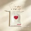 Bolsas de satén con cordón en stock, bolsas de embalaje para pelucas de seda sintética con cierre de cordón, bolsas antipolvo de satén con cordón de alta calidad.
