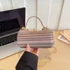 Bolso de mano nuevo de verano 2026 transfronterizo, de diseñador, lujo ligero, moda, versátil, con cadena para el hombro, cruzado, para la noche