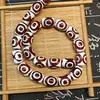 Venda direta da fábrica contas de ágata vermelha com três olhos contas de arroz contas tambor acessórios de contas Bodhi DIY pulseira colar com contas