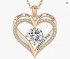 Europa y Estados Unidos transfronterizos súper ventas collar de doble corazón en oro rosa doceavo cumpleaños diamante joyería de alta gama venta directa de fábrica