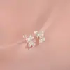 Brincos de laço de lírio design de nicho feminino brincos pequenos flor doce elegante brincos de prata