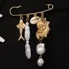 Broche cruzado de estilo vacacional de playa europeo y americano con colgantes de estrella de mar, caracola, concha, perla artificial para mujer, accesorio de cadena para pantalones multifuncional