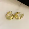 Pendientes metálicos vintage usados con patrón de viento, superficie brillante, sin clip para oreja para mujer, sin agujero en la oreja, pendientes de lujo ligero, sensación de alta gama para mujer