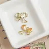 Una Variedad de Colgantes de Lazo de Aleación Dulces y Frescos Joyería Hecha a Mano DIY Collares de Mano Pendientes Colgantes Accesorios Materiales