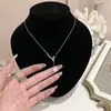 Collar de Serpiente con Borla y Perlas 2026 Nuevo Modelo Lujo Ligero Diseño de Nicho Cadena para Clavícula de Acero de Titanio Joyería de Celebridades de Internet Venta al por Mayor