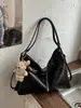 Bolso de gran capacidad con diseño de nicho moderno, nuevo y elegante bolso de hombro tipo tote de color liso con textura para mujer, otoño e invierno 2026