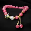 Pulsera de la Serie Guofeng de Venta Caliente Transfronteriza Cristal Rosa Diamante de Color Bolsa de la Fortuna Hebilla Ping An Bráctea de Loto Rosa Pulsera Hecha a Mano para Mujer