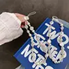 Nuevos Accesorios Colgantes de Perlas Blancas Cadena Colgante para Teléfono Móvil Cadena para Colgar Cámara CCD de Mujer Llavero Accesorios Hechos a Mano con Perlas