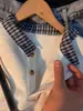Sudadera de cuadros tipo patchwork estilo americano, imitación de dos piezas para hombre, marca nueva y moderna, diseño holgado, top versátil con cuello polo, moderno
