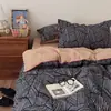 Juego de cuatro piezas de algodón lavado con gasa fruncida de cuadros simples Clase A, juego de tres piezas de gasa de doble capa a rayas de color liso estilo ins para dormitorios estudiantiles