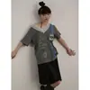 En stock, calidad originalNueva camiseta de verano de manga corta con cuello en V y encaje empalmado