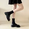 Zapatos pequeños de cuero estilo británico, zapatos tipo mocasín slip-on para falda, punta redonda, nuevo estilo otoño e invierno, con suela gruesa, diseño 2026