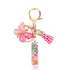 Moda Nuevo Rosa Pegamento Goteando Letra Llavero Lentejuelas Mariposa Borla Colgante Accesorios Colgantes de Bolso Venta al por Mayor