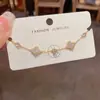 Pulsera de Flor de Cuatro Hojas con Microincrustaciones de Circonita, Estilo Francés de Lujo Ligero, Exquisita, a la Moda, Versátil, de Gama Alta, Joyería Súper Brillante al por Mayor