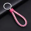 Llavero colgante de cuerda de cuero tejido de fábrica con cabeza de plástico para pareja, llavero de coche de cuero, colgante, accesorios, venta al por mayor