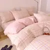 Juego de ropa de cama de cuatro piezas de algodón puro, algodón 100% lavado, ropa de cama a cuadros simple para dormitorio de estudiante, juego de tres piezas de sábana y funda de edredón 4