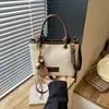 2026 Nuevo Diseño de Nicho Casual Simple Único Retro Bolso Cuadrado Pequeño Bolso de Hombro Cruzado de Moda para Mujer