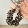 Nuevo brazalete de tela plisado floral pequeño vintage, cordón corto para teléfono, correa versátil para llavero, en stock