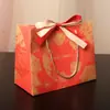 Bolsas de Regalo de Año Nuevo Time Bolsas de Empaque Transfronterizas Bolsas de Regalo Rojas de Cumpleaños en Stock Bolsas Totales Universales Descuento por Volumen