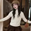 Camiseta básica de niña estilo coreano con estampado floral pequeño, nueva colección otoño/invierno 2026, para niños de talla mediana y grande, con cuello semi-alto y detalle de lazo, hecha de tela polar suave, capa interior de moda