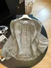Blusa blanca con ribete de encaje estilo coreano para mujer, cuello redondo, de un solo pecho, dobladillo con volantes, mangas largas abullonadas, top para principios de otoño