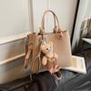 Bolsa Saco Feminina 2025 Primavera Nova Nicho Padrão Lichia Bolsa de Mão Simples Têxtil Versátil Bolsa de Ombro Transversal Tendência