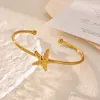Serie Oceánica Chapado en Oro de 18 Quilates Acero Inoxidable Brazalete Abrible Forma de Estrella de Mar y Concha Estilo Vacacional Pulsera Personalizada Transfronterizo