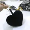 Colgante de Bolsa Lindo con Forma de Corazón de Piel de Conejo Llavero de Corazón de Felpa Bola de Piel con Forma de Corazón de Gama Alta Venta al por Mayor desde el Fabricante