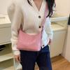 Bolso pequeño dulce portátil francés 2024 Otoño Nueva moda Estilo occidental Simple Hombro Axila Media luna