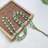 Venta al por mayor del fabricante collar de cuentas de jade de vidrio colgante atado cadena de cuentas colgantes obsidiana calcedonia jadeíta cuerda de colgar línea