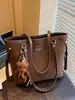 Bolso de Axila para Mujer 2025 Nuevo Estilo de Gama Alta Retro Bolso Tote para Viajar Gran Capacidad Versátil Bolso Cruzado de Hombro
