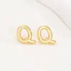 Pendientes de letras de burbuja lisas con baño de cobre y oro real transfronterizos, moda, temperamento, Joker, nuevos pendientes exquisitos, venta al por mayor