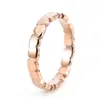 Europa y Estados Unidos transfronterizo nuevo anillo simple de círculo de amor para mujer pequeño fresco acero de titanio anillo de oro de 18 quilates joyería dulce