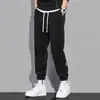 Pantalones de chándal de nuevo estilo Otoño e Invierno para Hombre Pierna Suelta Rayados Pantalones Deportivos de Pana para Hombre Pantalones Casuales Marca de Moda