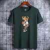 Venta al por mayor nueva camiseta de algodón de manga corta para hombre y tendencia para hombre Nueva camiseta holgada de media manga estampada una generación de cabello