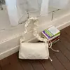 Chegada Nova Primavera 2026 Bolsa Feminina Casual Grande Capacidade Personalizada Bolsa de Braço de Nicho Bolsa de Ombro Transversal Simples