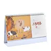 Calendário de Mesa Elevado 2027 Personalizado Novo Calendário de Mesa com Suporte em Papel Pérola Hot Stamping Publicidade Ano do Carneiro Calendário de Mesa Presente Atacado