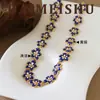 Collar de flor de esmalte azul exquisito versátil de moda retro ins europeo y americano con una cadena para la clavícula de sensación de lujo ligero y alta gama