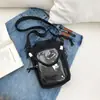 Bolso para teléfono de nuevo estilo 2026, con compartimento para botella de agua y colores contrastantes, un bolso cruzado ligero y lindo para mujer