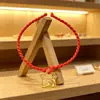 Jóias de estande cordão vermelho atacado cor do ano de nascimento plástico pequenas estrelas pulseira de cordão vermelho tecida à mão